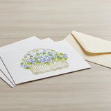 Hydrangea Basket Wall Stencil that has been painted onto a white notecard.