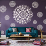 Karma Mandala Wall Stencil painted onto a purple wall with modern Indian furnishings.