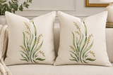 stenciled grasses painted with vibrant fabric paint on Pillows in living room