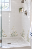 Grasses painted on shower wall
