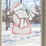 Decorative window stencil using snow spray of a snowman with a Santa hat and red scarf on a snowy background.