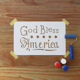 Wooden sign with 'God Bless America' engraving on a wooden surface