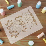 Wooden sign with 'Happy Easter' text and decorative elements on a wooden surface