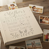 Textual quote about mothers and children with hearts and handprints on a white background