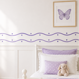 Wavy Border Stencil Design painted on a little girl's wall in purple