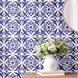 Collage of blue and white patterned tiles in various settings.