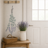 The hanging Lavender Stencil that has been painted onto an entryway wall.