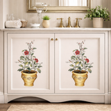 Bathroom vanity with decorative floral stencils on the doors