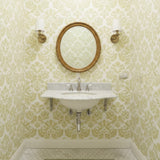 Gold damask pattern on a white background using the Damask All Over Stencil.