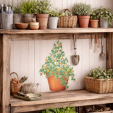 Wooden workbench with potted plants and gardening tools against a wooden wall.
