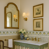 Bathroom with vanity, mirror, and decorative elements