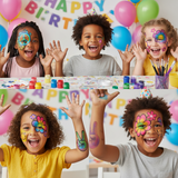 Children with face paint and balloons celebrating a birthday party.