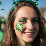 St. Patrick's Day Face Painting Stencil Set applied to a women's cheek while she attends a St. Patrick's Day Parade.
