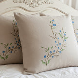 Decorative linen pillows stenciled with the Blueberry Spray Stencil 