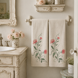 Simply rosebuds stencil that has been painted onto linen towels that hang in a powder room