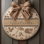 Woodland Welcome Round Sign Stencil Painted onto a wooden sign and hung on a front door.
