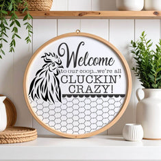 Round sign stencil displaying 'Welcome to our coop...we're all cluckin' crazy!' for decorative farmhouse décor.