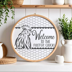 Decorative Round Sign Stencil featuring 'Welcome to the Fuster Cluck' for home décor and craft projects.