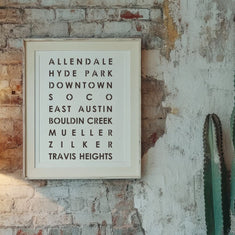 Austin Subway Art Poster Stencil painted onto a blank canvas and framed in an urban rustic living room