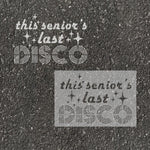 Text 'This Seniors Last Disco' stenciled on pavement with matching stencil.