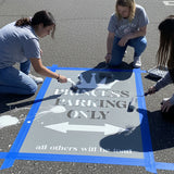 Text 'Princess Parking Only' stenciled on pavement with matching stencil.