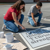 Philippians Bible Verse stenciled on pavement with matching parking space stencil.