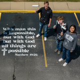 Text quote 'With man this is impossible, but with God all things are possible' from Matthew 19:26 on a white background