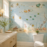Bathroom with underwater-themed wallpaper featuring fish and coral.