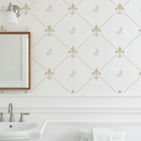 Bathroom with white walls featuring a stenciled Fleur de Lis pattern, sink, and mirror.
