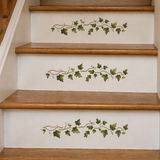 Wooden staircase with decorative ivy patterns on the risers