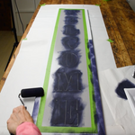Apply paint using a roller to your Custom Stencils.
