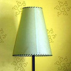 Spiral Motif Accent Stencil painted on a yellow wall