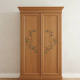 Blueberry Spray Stencil stenciled onto a country style armoire
